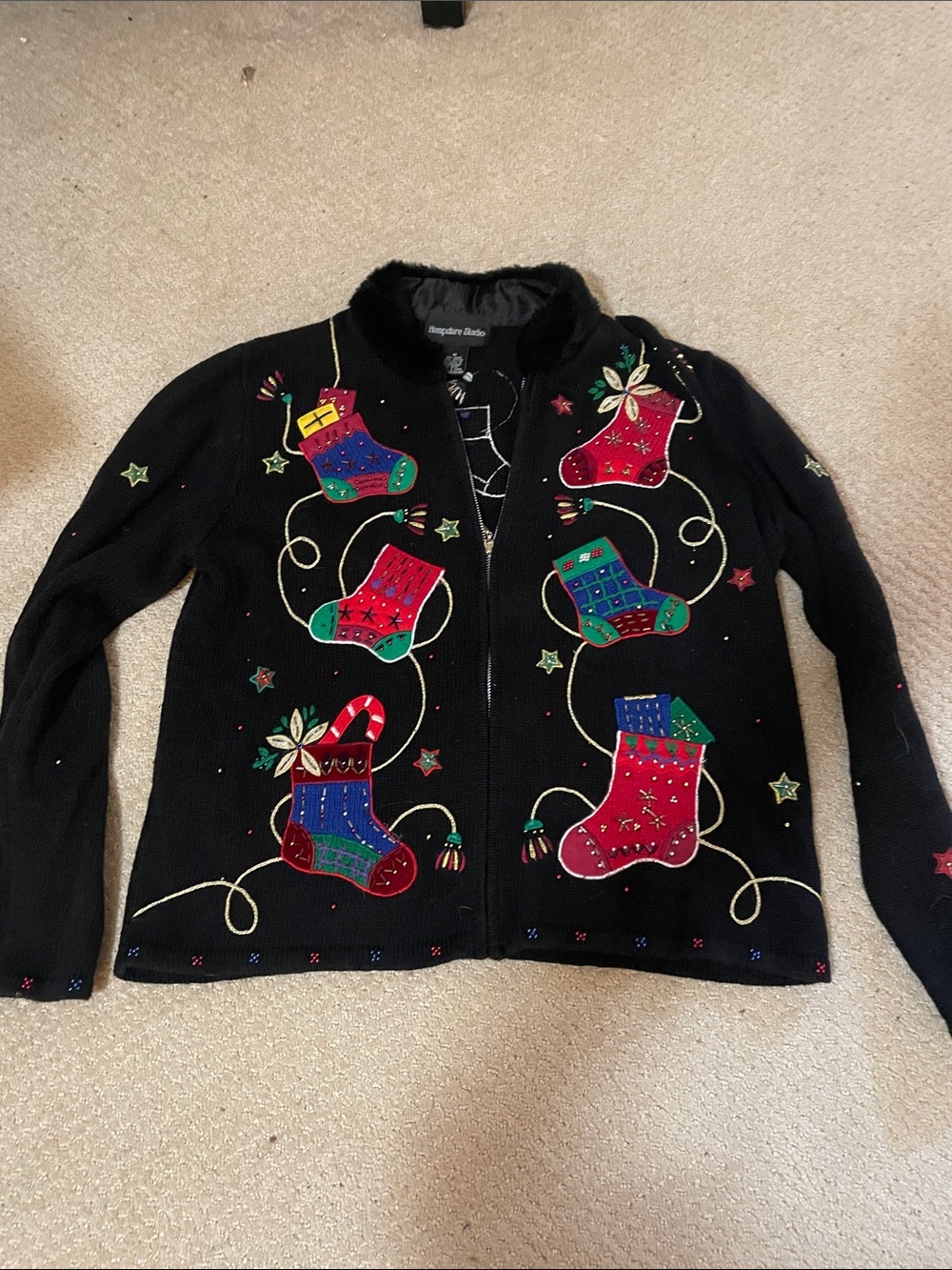 WONDERLAND Black Holiday Kids Zip-Up Jacket with Colorful Stocking Appliqués